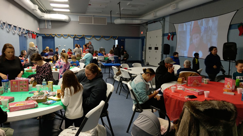 People enjoying the Gigerbread House Making Event in 2019 at Mayo Park Center