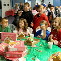 Kids at Gingerbread House Making