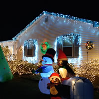 Inflatable snowman with penguins